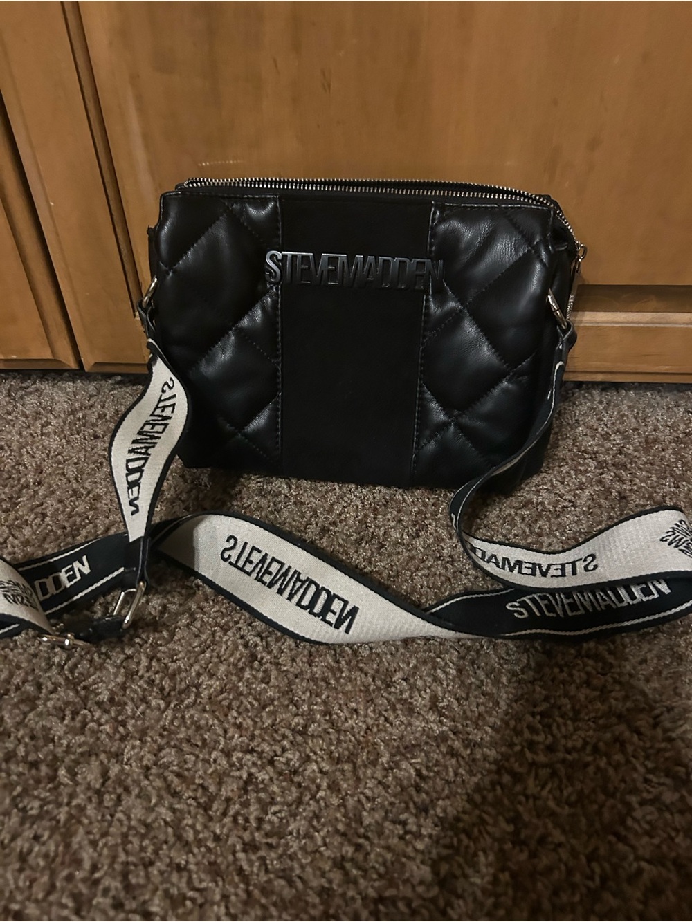 Steve Madden Black Quilted Messenger Bag with White Logo Strap